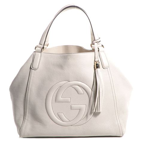 517556zlk903285 gucci|white Gucci handbag.